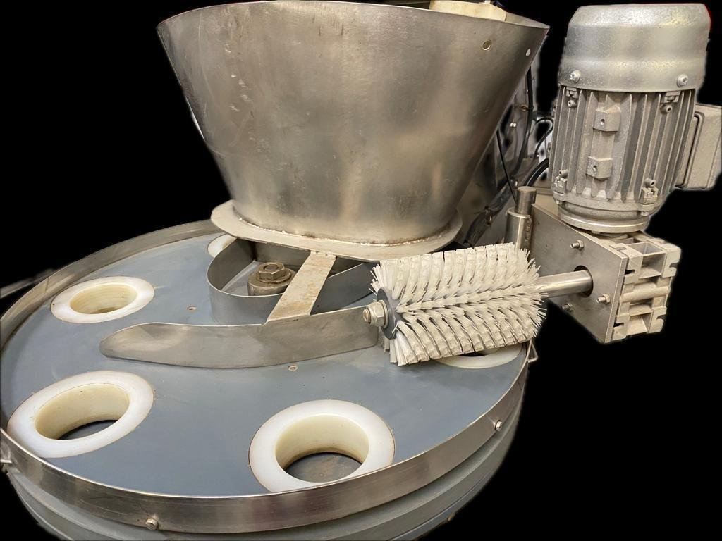 Plato alimentador volumétrico ajustable